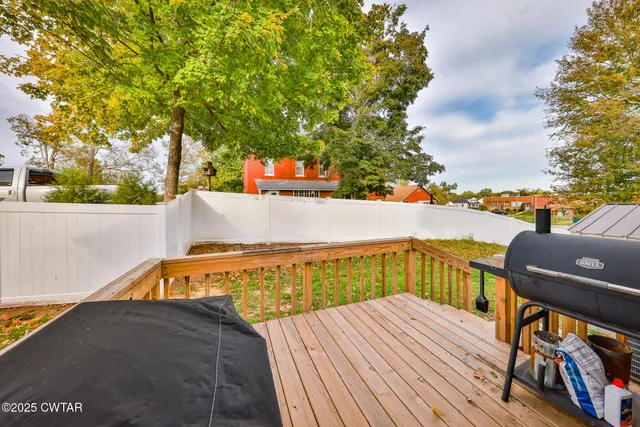 a view of swimming pool with seating space