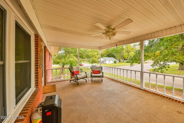 a view of a city street from a balcony