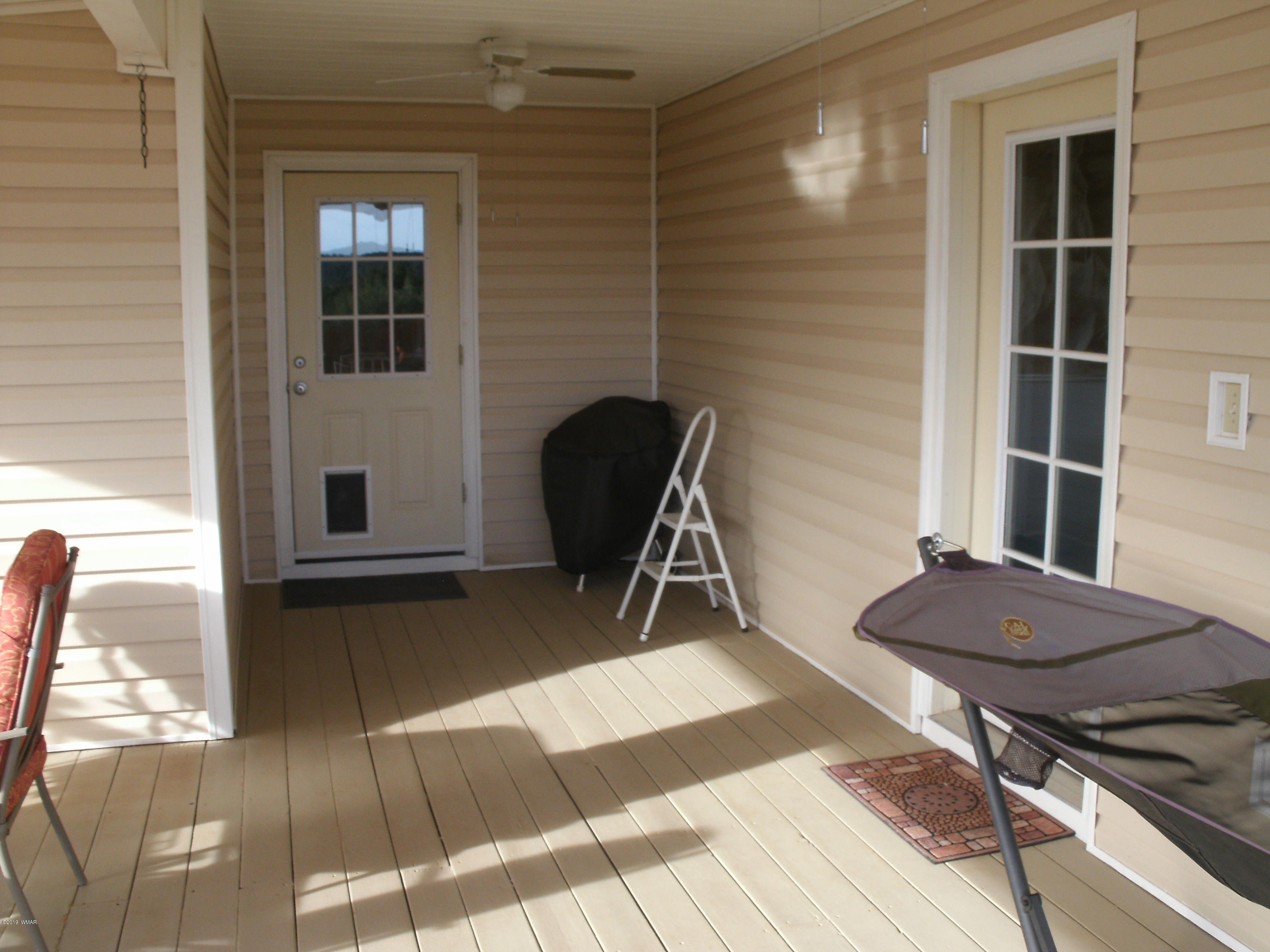 4078 East Pinto Road Snowflake, AZ 85937 - Photo 15 of 49 a room with furniture and a window