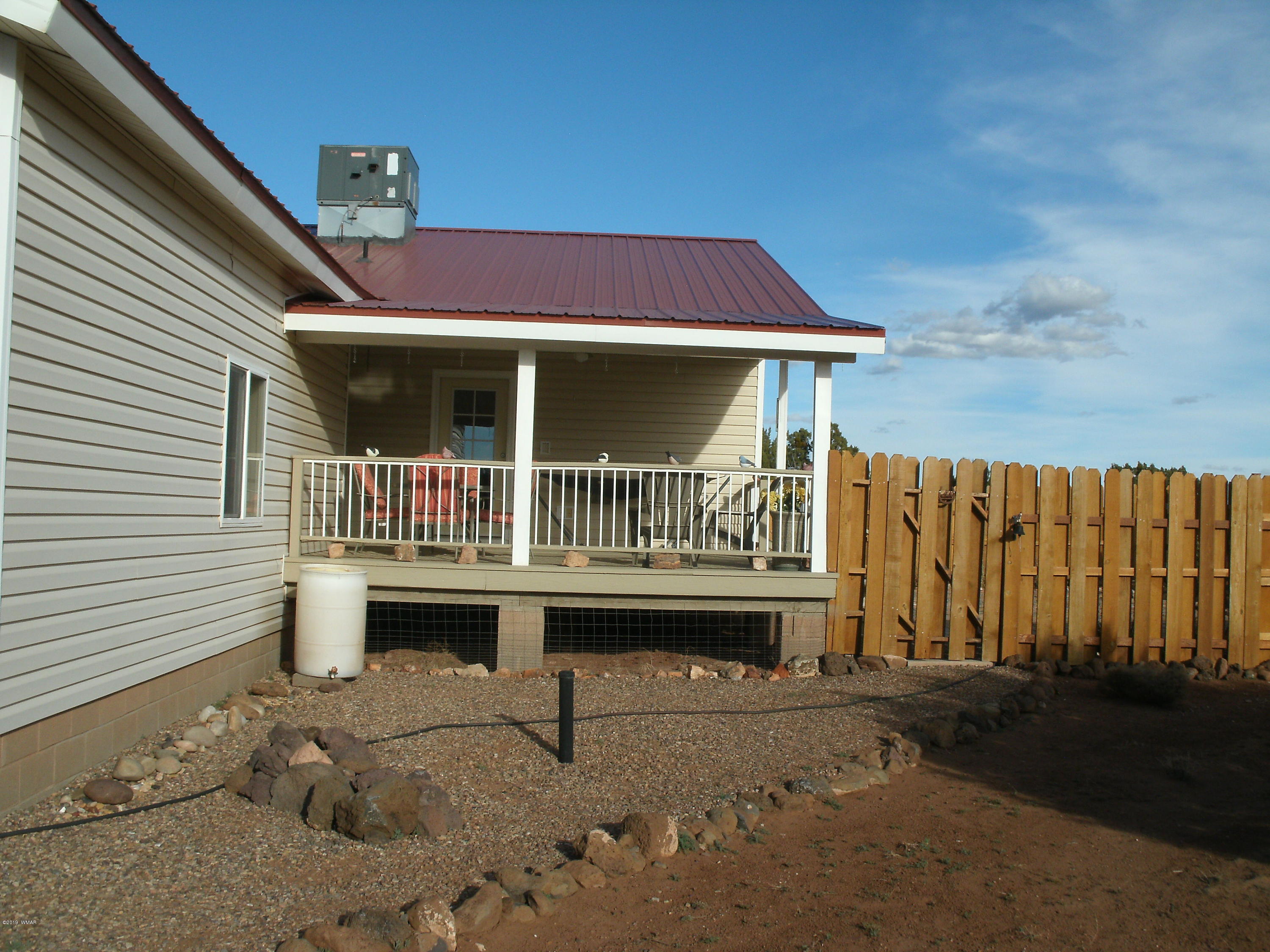 4078 East Pinto Road Snowflake, AZ 85937 - Photo 16 of 49 a view of a deck with a table and chairs