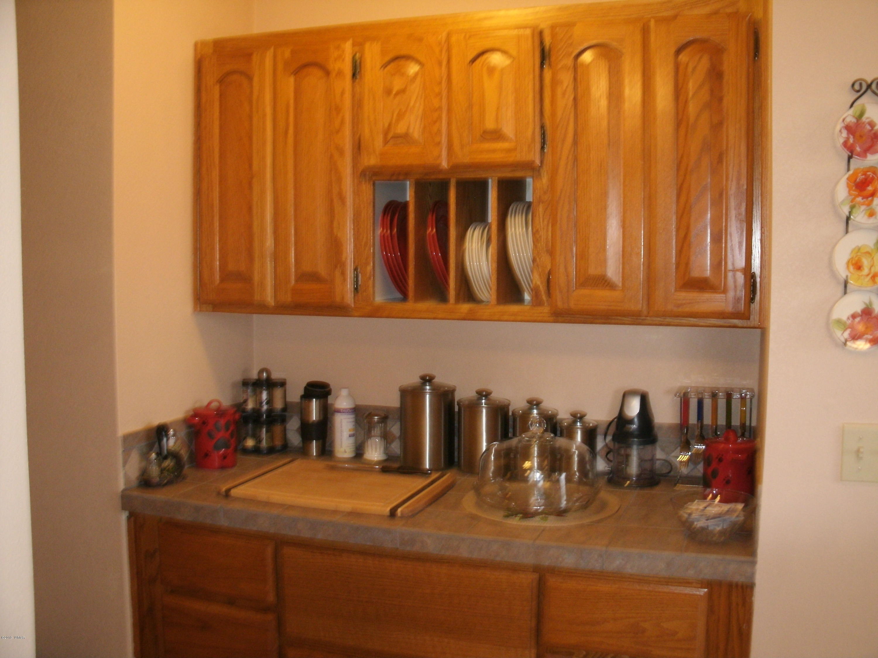 4078 East Pinto Road Snowflake, AZ 85937 - Photo 26 of 49 a kitchen with a sink and cabinets