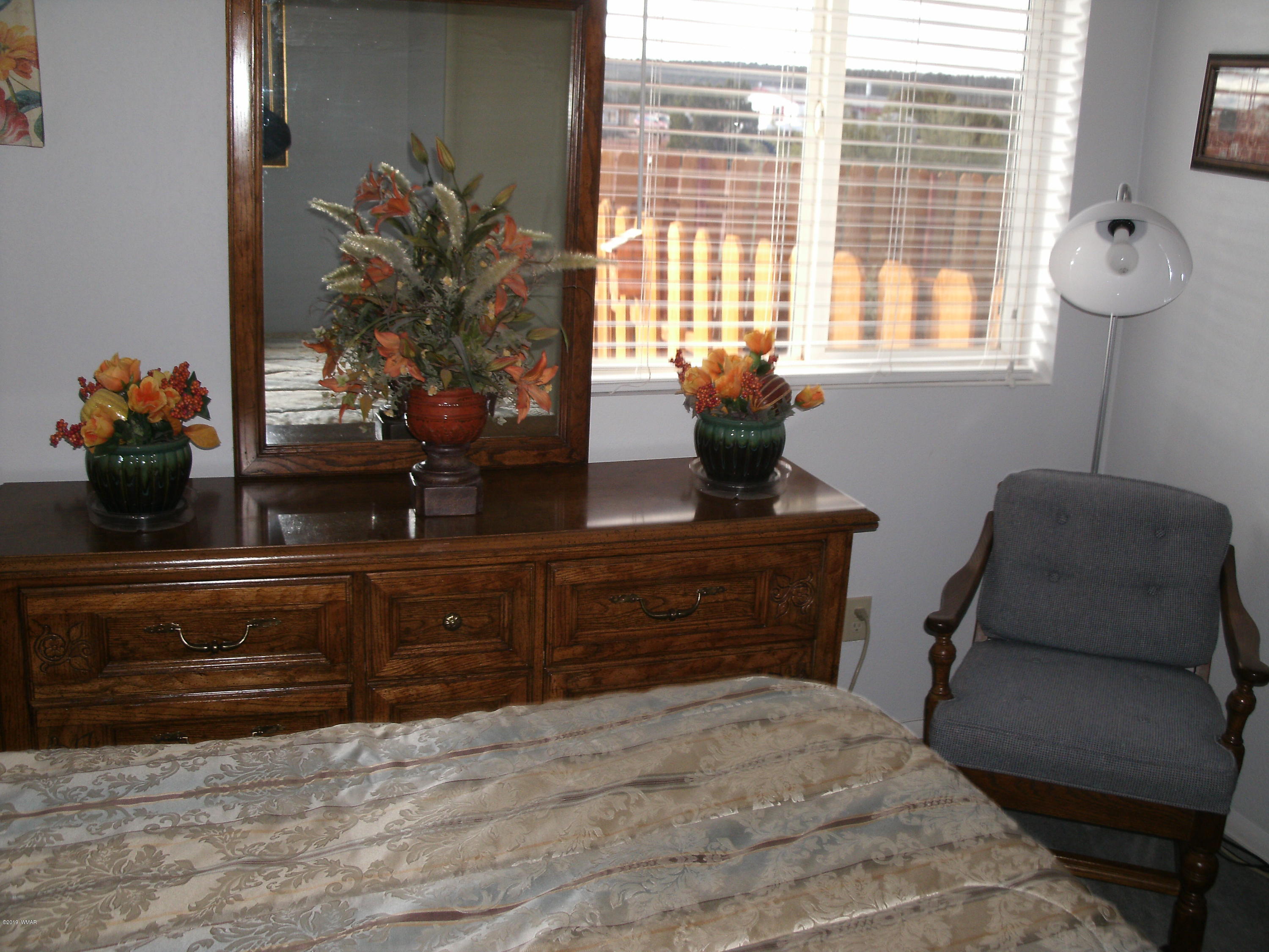 4078 East Pinto Road Snowflake, AZ 85937 - Photo 36 of 49 a living room with furniture and a potted plant