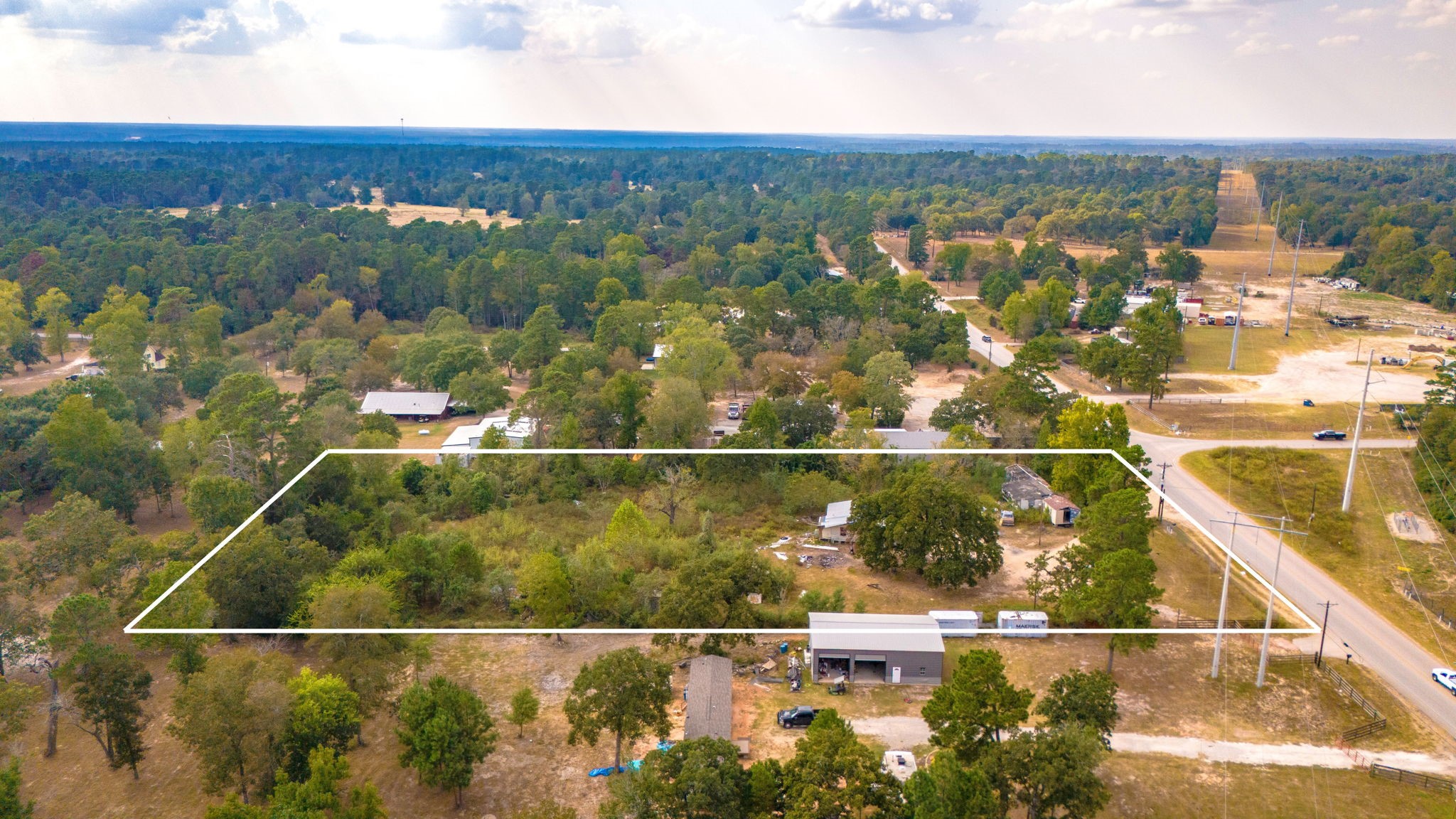 19791 Keenan Cut Off Road Montgomery, TX 77316 - Photo 2 of 41 an aerial view of residential houses with outdoor space