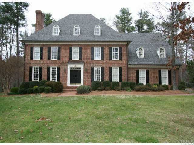 221 Carp Way Raleigh, NC 27615 - Photo 1 of 1 a front view of a residential apartment building with a yard