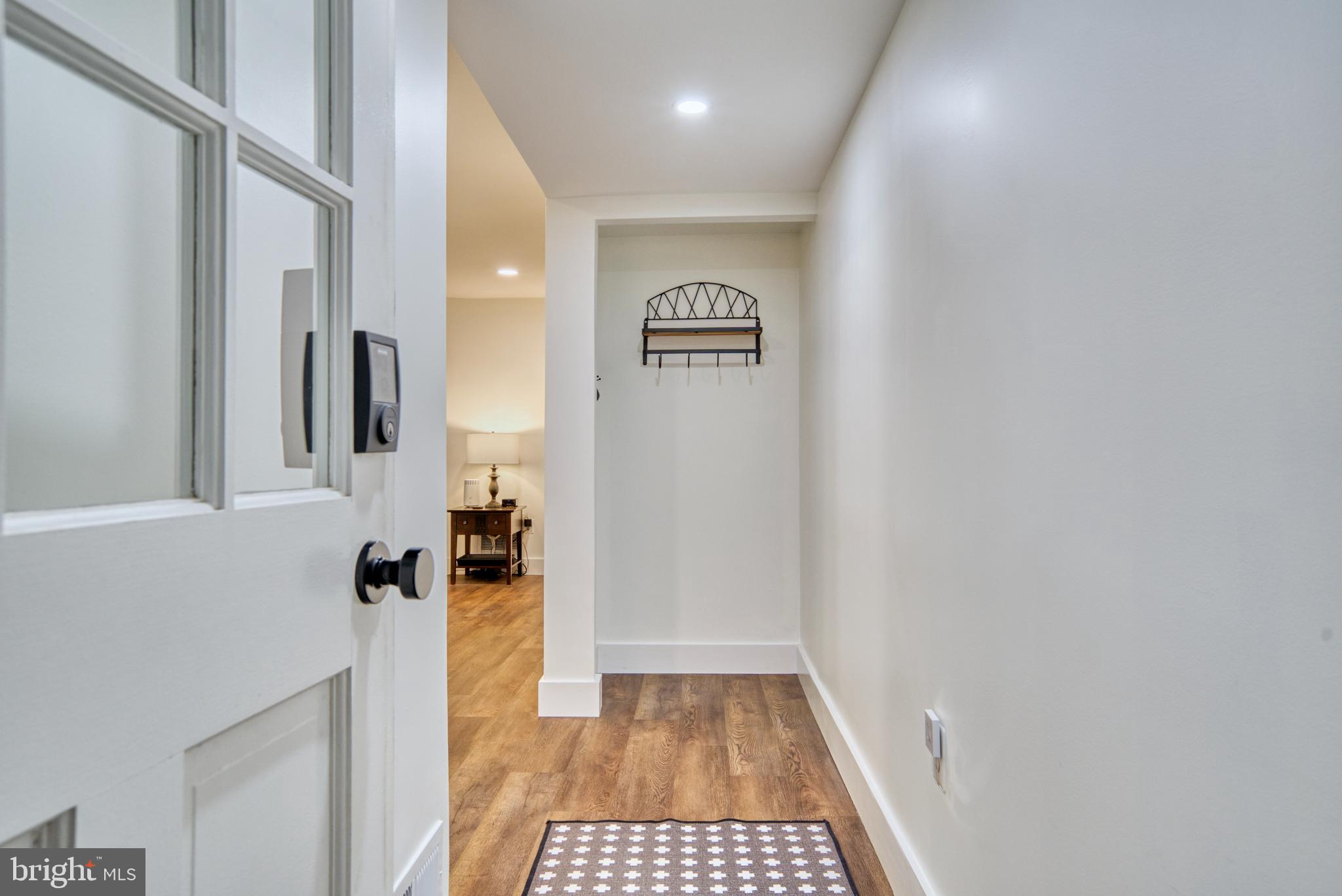 12010 Trotter Lane Reston, VA 20191 - Photo 33 of 79 Hallway from garage w/ drop off area