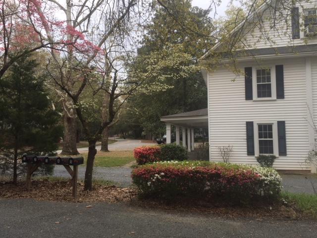 95 Community Road, Unit APPT 2 Pinehurst, NC 28374 - Photo 6 of 16 Back view of house looking through private car park