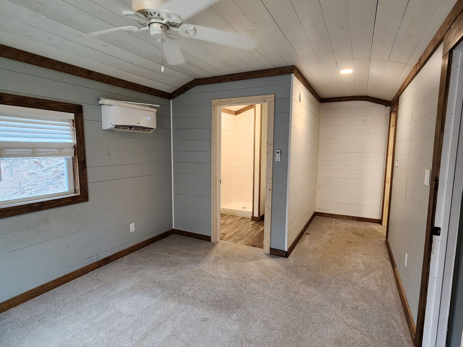 2179 Hackney Road Greenbrier, TN 37073 - Photo 18 of 20 en empty room with windows and ceiling fan