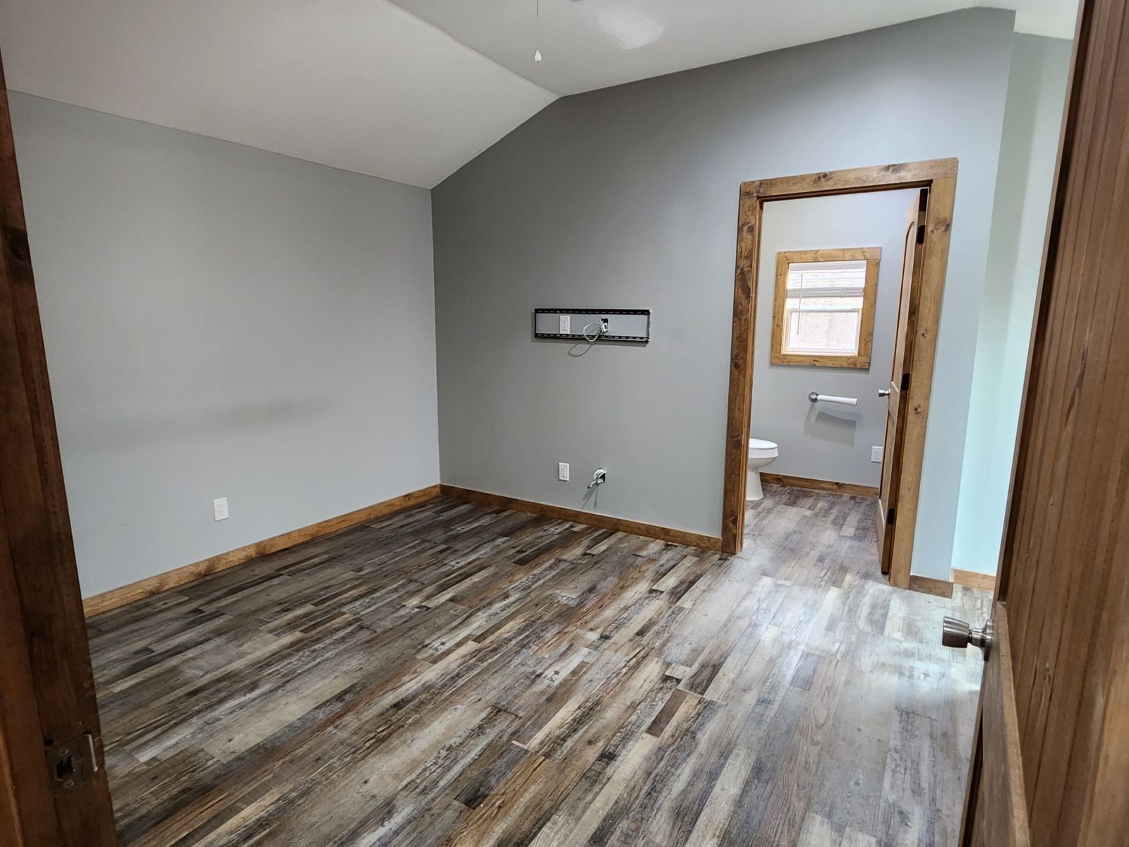 2179 Hackney Road Greenbrier, TN 37073 - Photo 10 of 20 a view of a room that has a bed and wooden floor