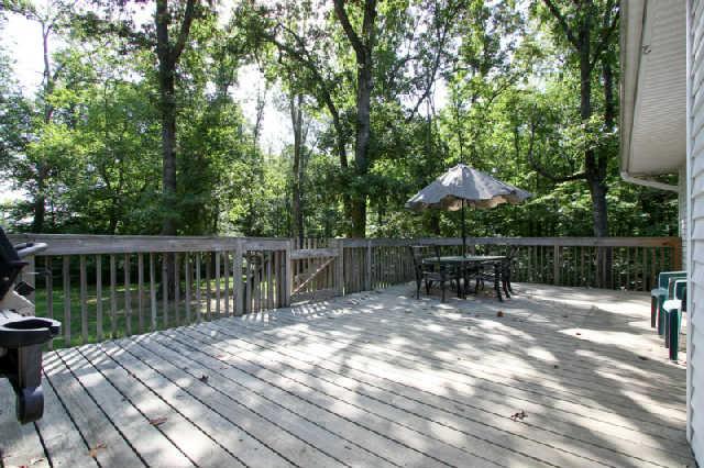7584 Crow Cut Road Fairview, TN 37062 - Photo 20 of 20 View of completely fenced, very private back yard. Ideal for pets and/or small children. Plenty of room for backyard games. There is a temperature controlled room for dogs accessible only from this deck.Stays same temp as home.