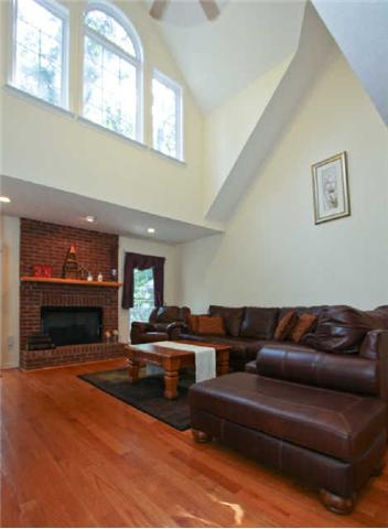 7584 Crow Cut Road Fairview, TN 37062 - Photo 7 of 20 Another view of great room showing second story windows and ceiling fan. This is a wonderful place for gathering with your friends for game night or just 'visiting'.