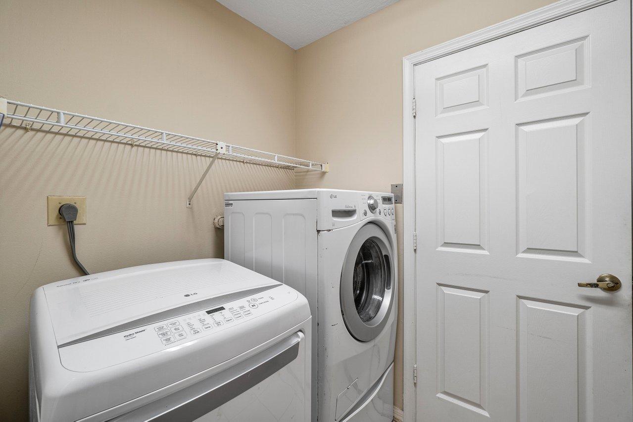 10921 Haydn Drive Boca Raton, FL 33498 - Photo 38 of 45 a utility room with dryer and washer