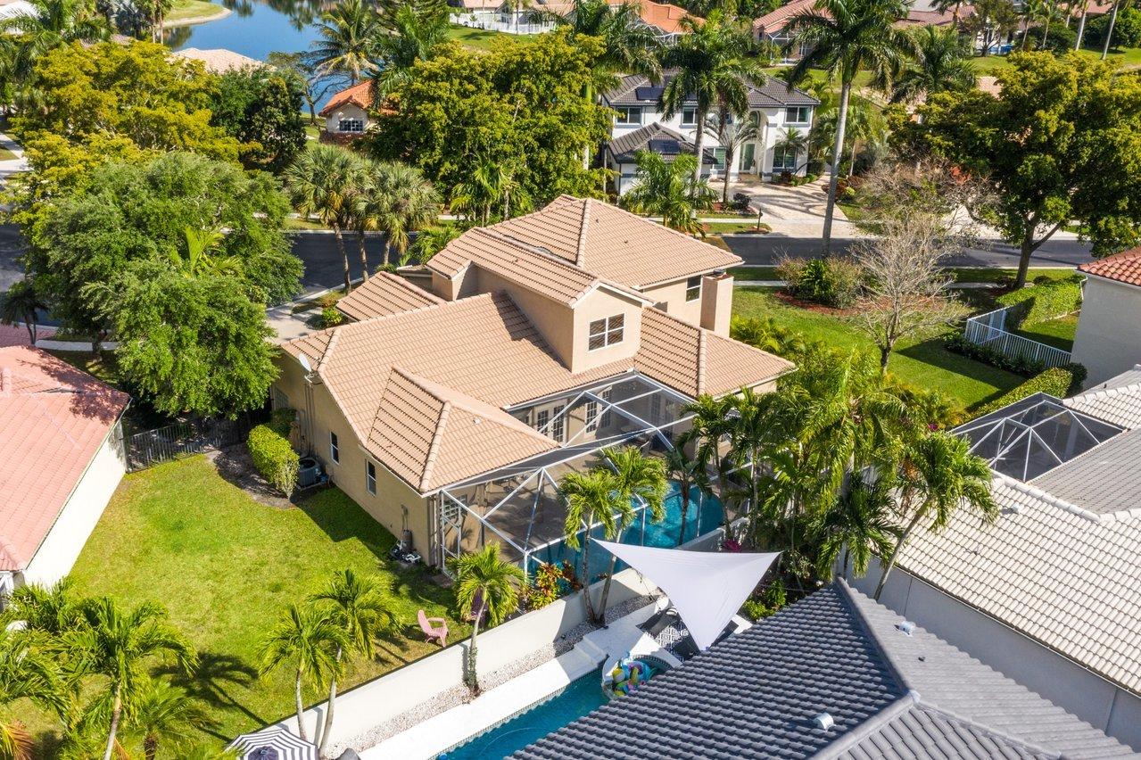 10921 Haydn Drive Boca Raton, FL 33498 - Photo 4 of 45 an aerial view of a house with a yard