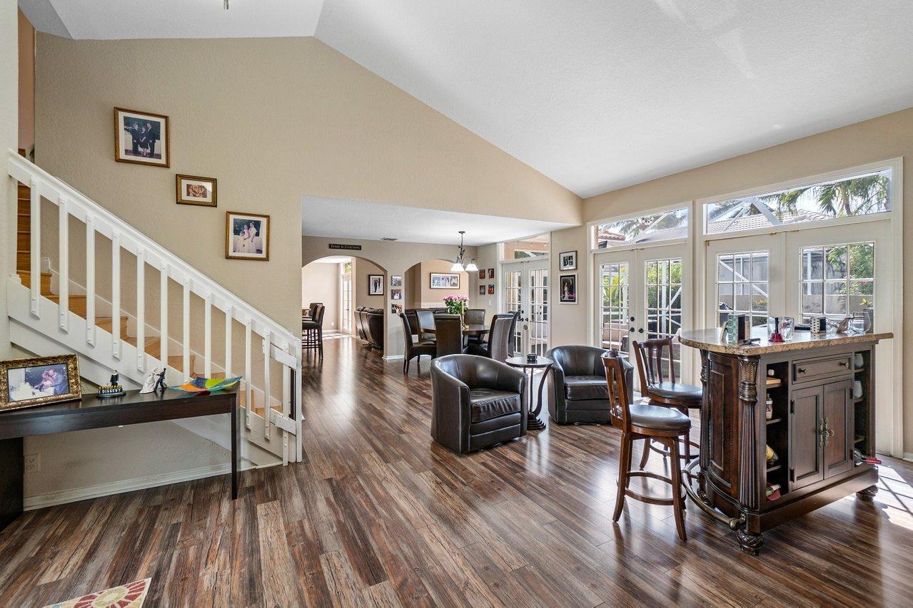 10921 Haydn Drive Boca Raton, FL 33498 - Photo 7 of 45 a living room with furniture and a wooden floor