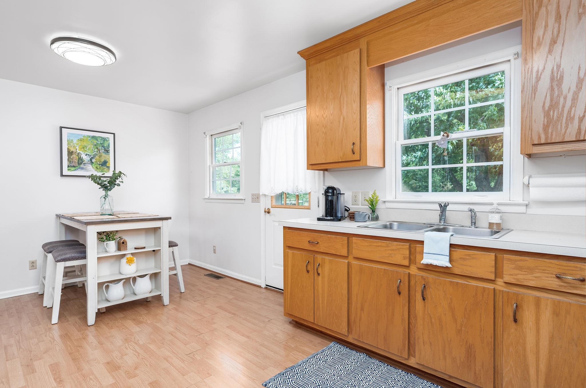479 Battlefield Road Fort Defiance, VA 24437 - Photo 21 of 51 a kitchen with a sink cabinets and window