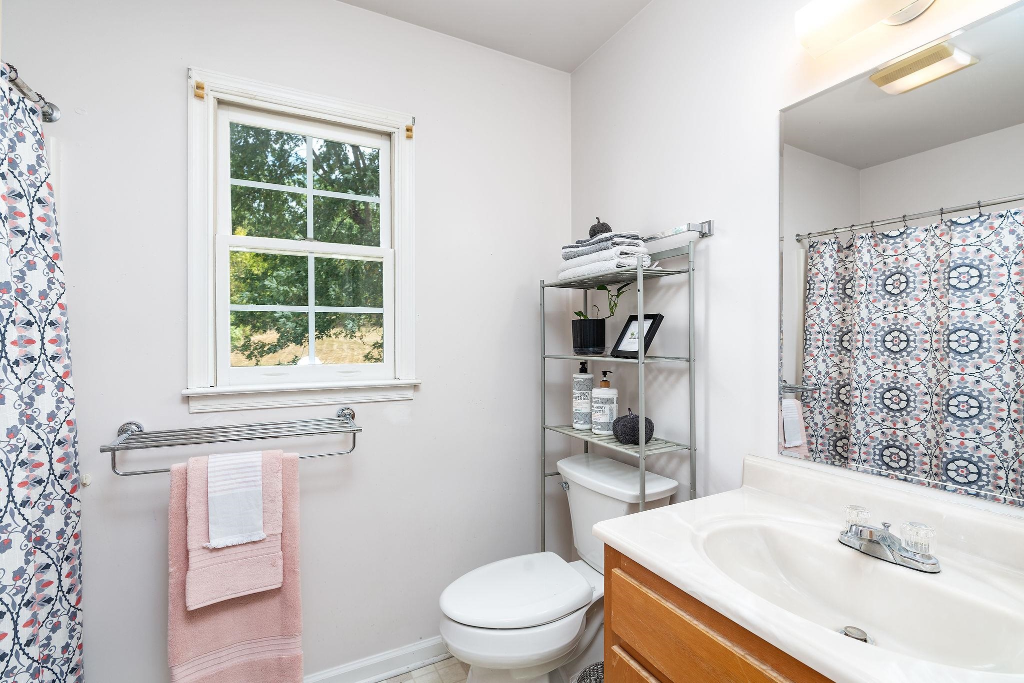 479 Battlefield Road Fort Defiance, VA 24437 - Photo 25 of 51 a bathroom with a sink a toilet and shower