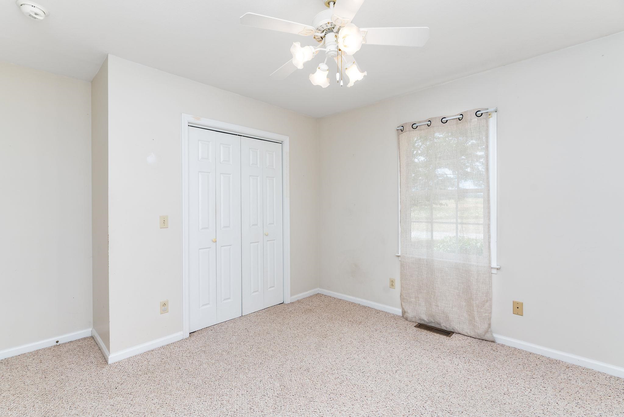 479 Battlefield Road Fort Defiance, VA 24437 - Photo 29 of 51 an empty room with chandelier fan