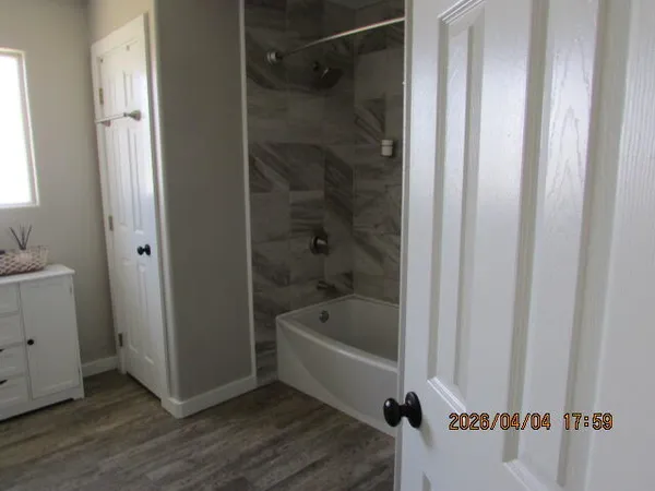 a bathroom with a sink and a shower