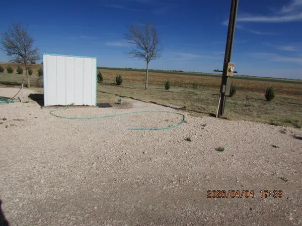 a view of a backyard of a house