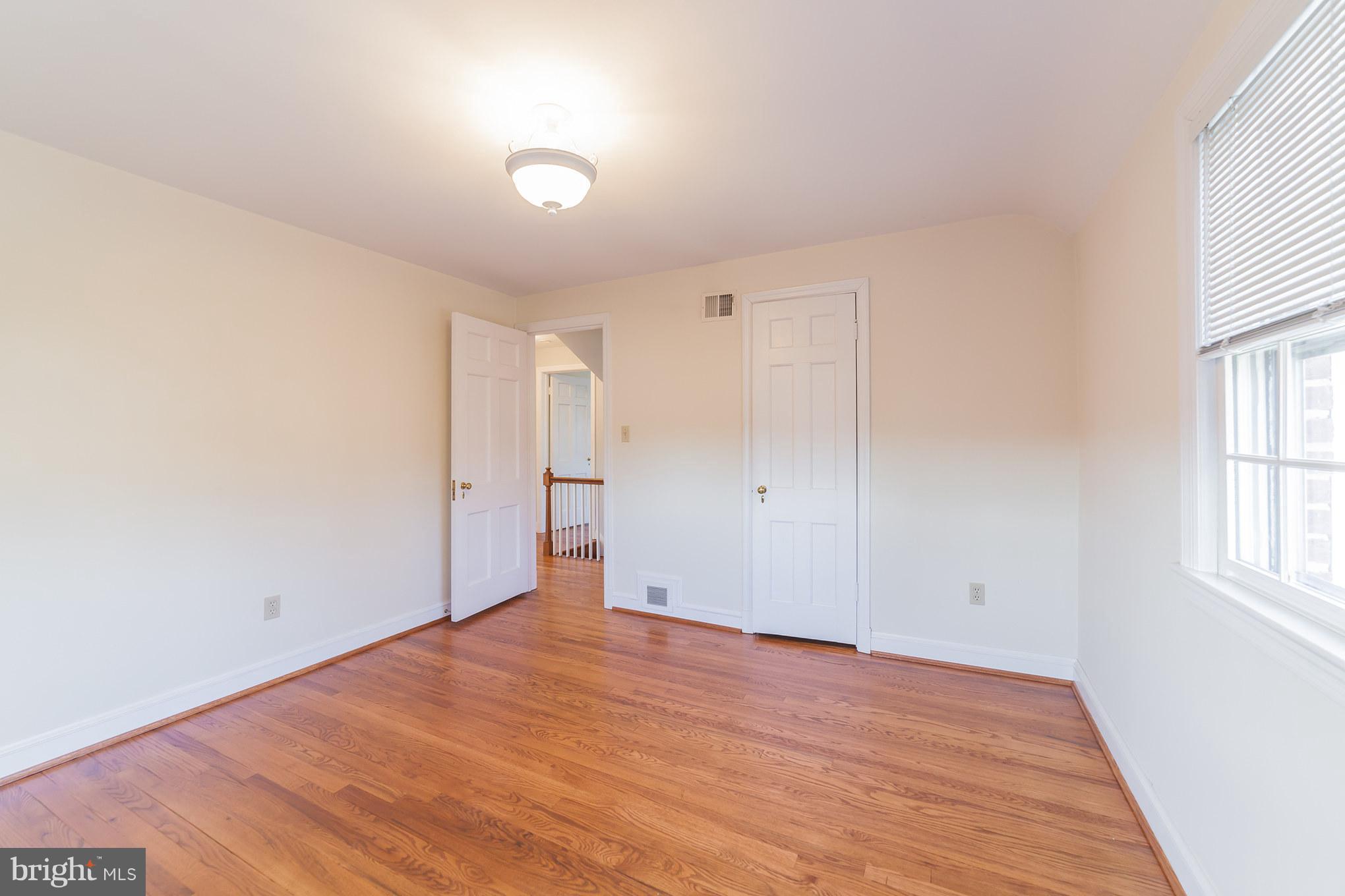 9508 St Andrews Way Silver Spring, MD 20901 - Photo 21 of 30 Bedroom 3 towards closet and hallway