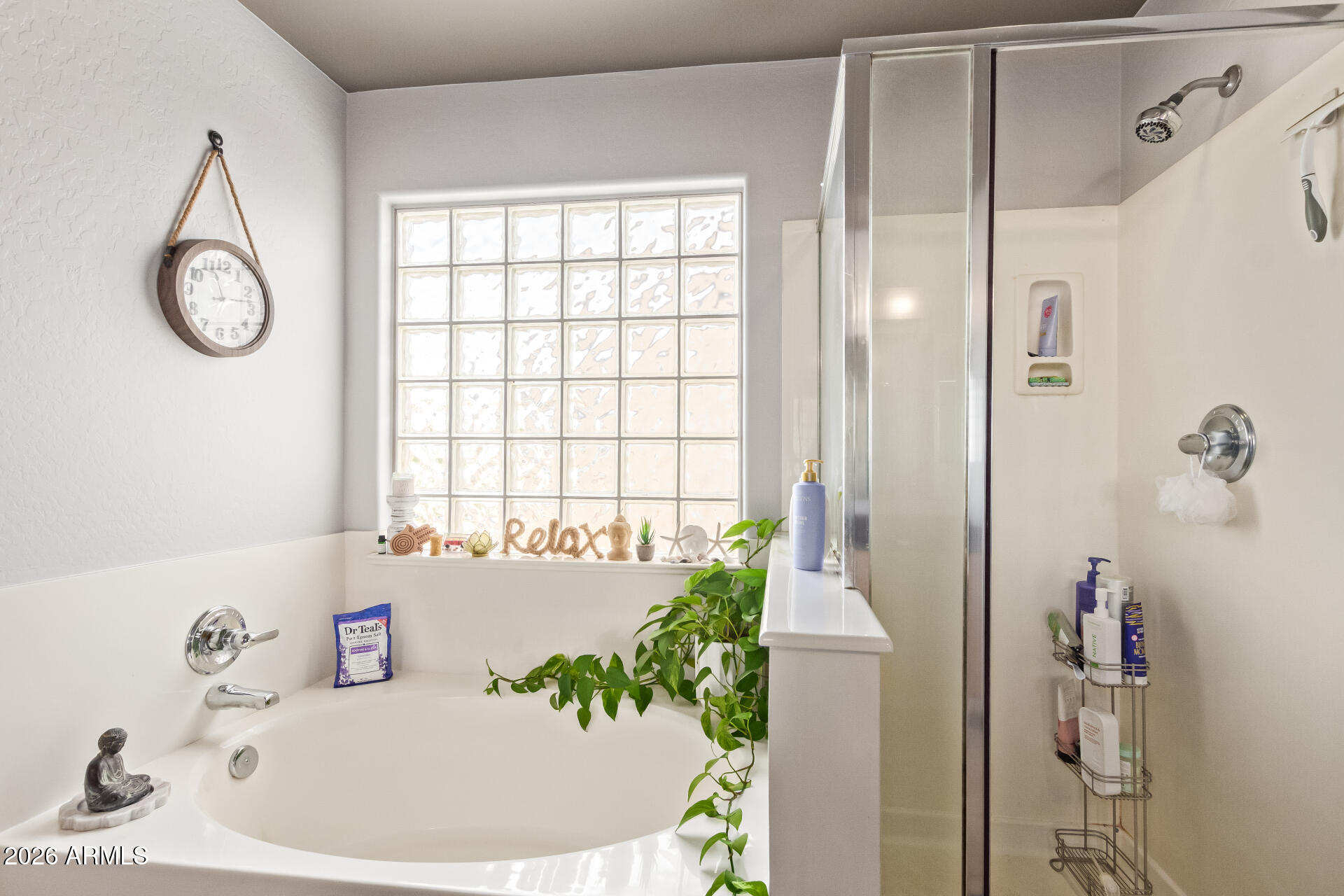 22838 South Legends Road Queen Creek, AZ 85142 - Photo 11 of 22 a bath room with a sink and a mirror
