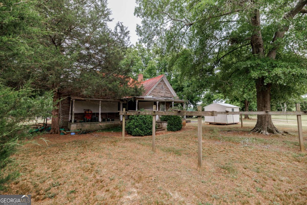 6.04-acres Old Bishop Road Bishop, GA 30621 - Photo 29 of 30 a view of a house with a yard and sitting area