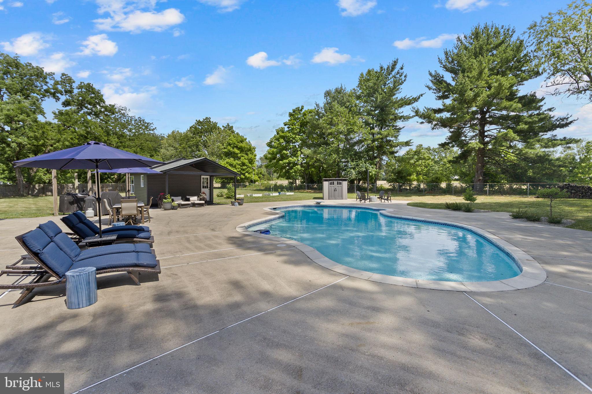 2576 Monmouth Road Jobstown, NJ 08041 - Photo 45 of 55 Serene poolside retreat awaits you.