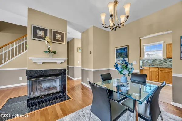 a view of kitchen and wooden floor