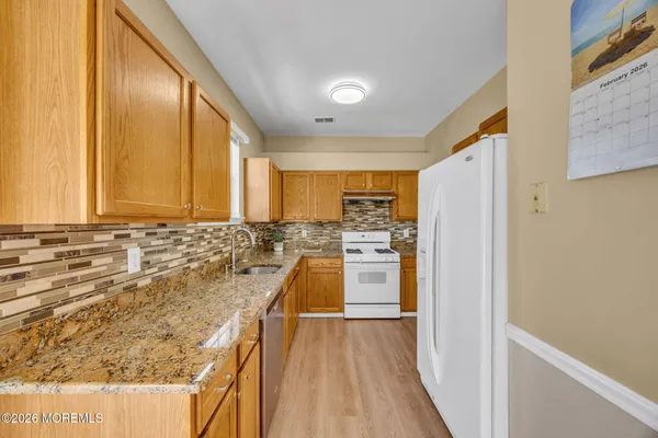 a bedroom with a bed and a view of bathroom