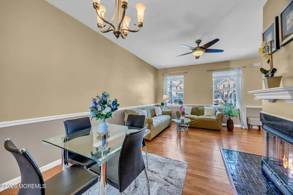 a view of an entryway with wooden floor