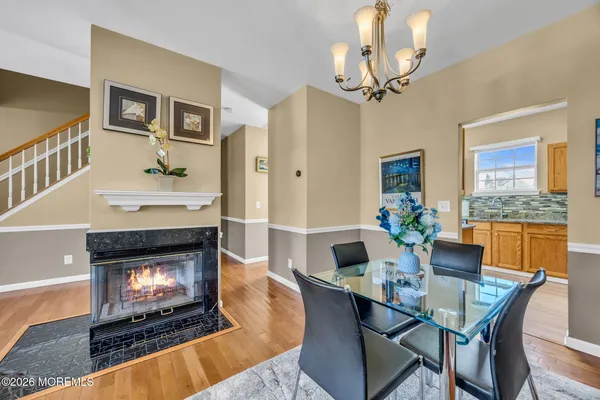 a kitchen with stainless steel appliances granite countertop a stove and a refrigerator