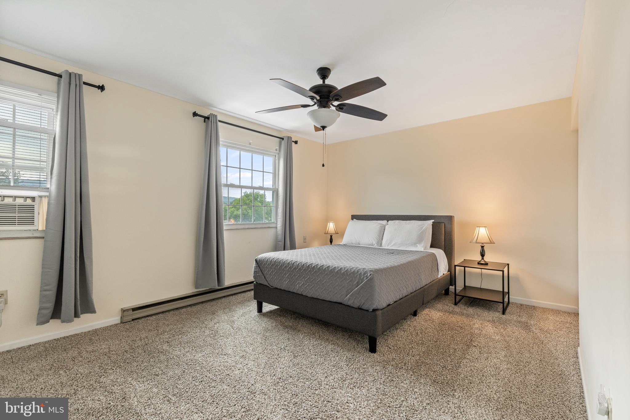 276 Broad Street Highspire, PA 17034 - Photo 15 of 28 a bedroom with a bed and window