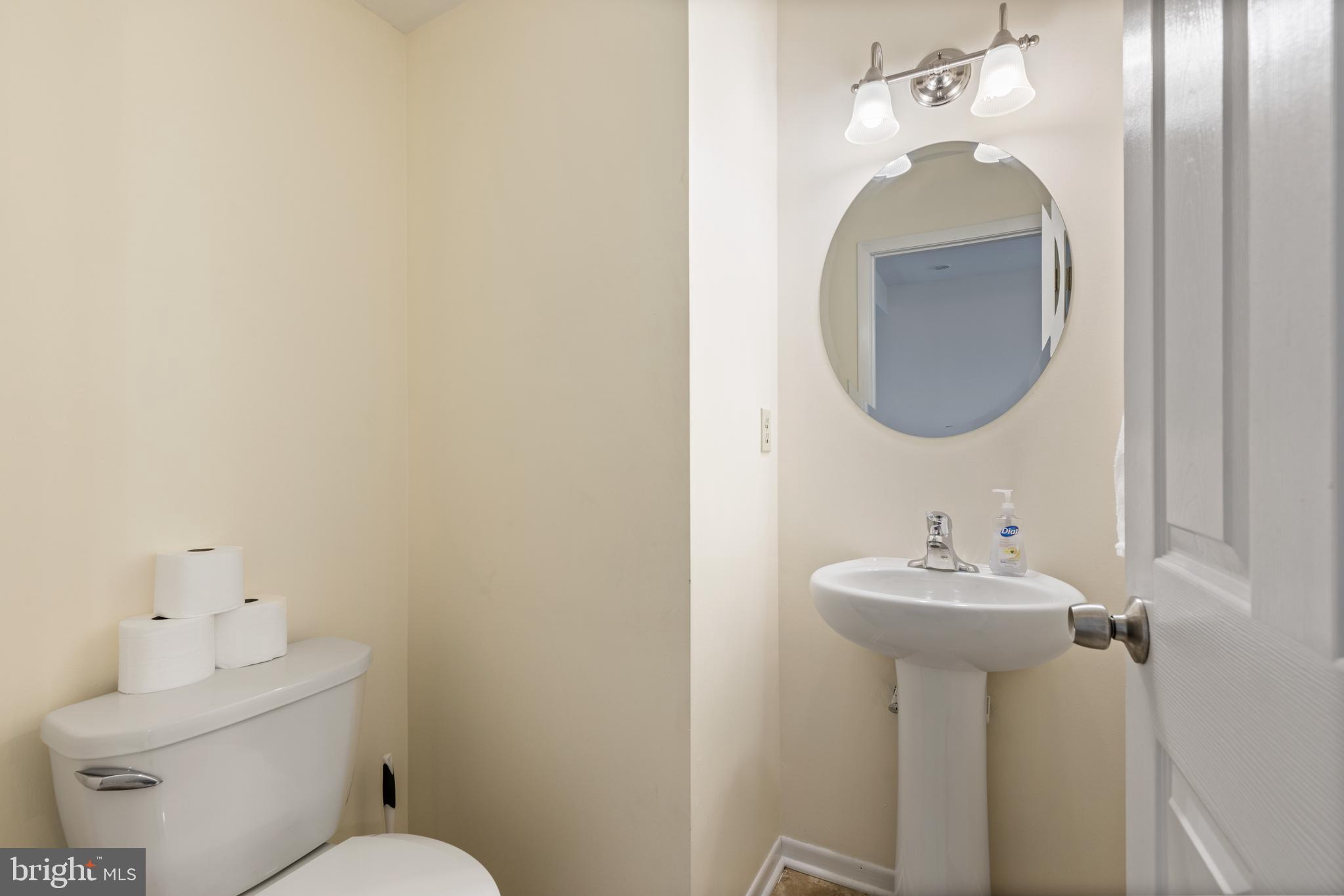 276 Broad Street Highspire, PA 17034 - Photo 10 of 28 a bathroom with a sink and mirror