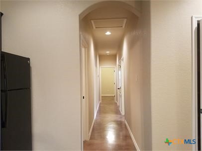 1509 Lucille Street Seguin, TX 78155 - Photo 6 of 11 a view of a hallway with a wooden floor