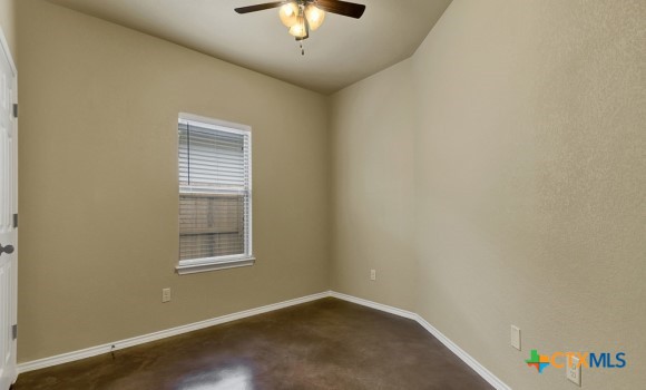1509 Lucille Street Seguin, TX 78155 - Photo 9 of 11 an empty room with a window