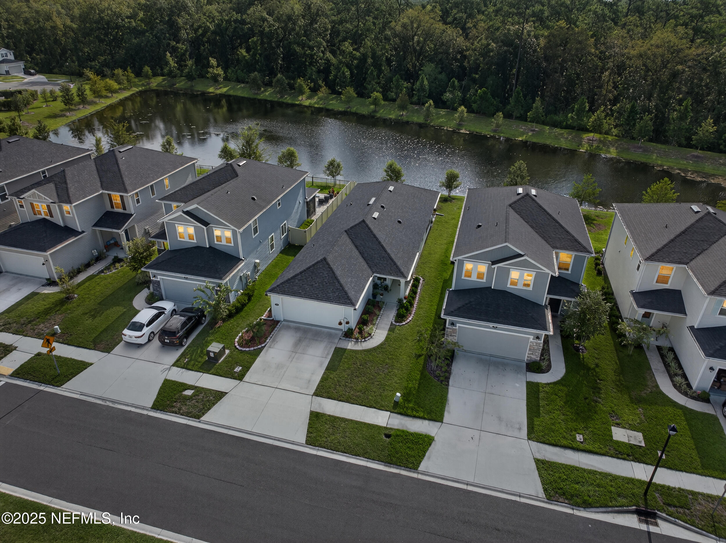 318 Rambling Brk Trail St. Johns, FL 32259 - Photo 2 of 26 an aerial view of house with yard and lake view