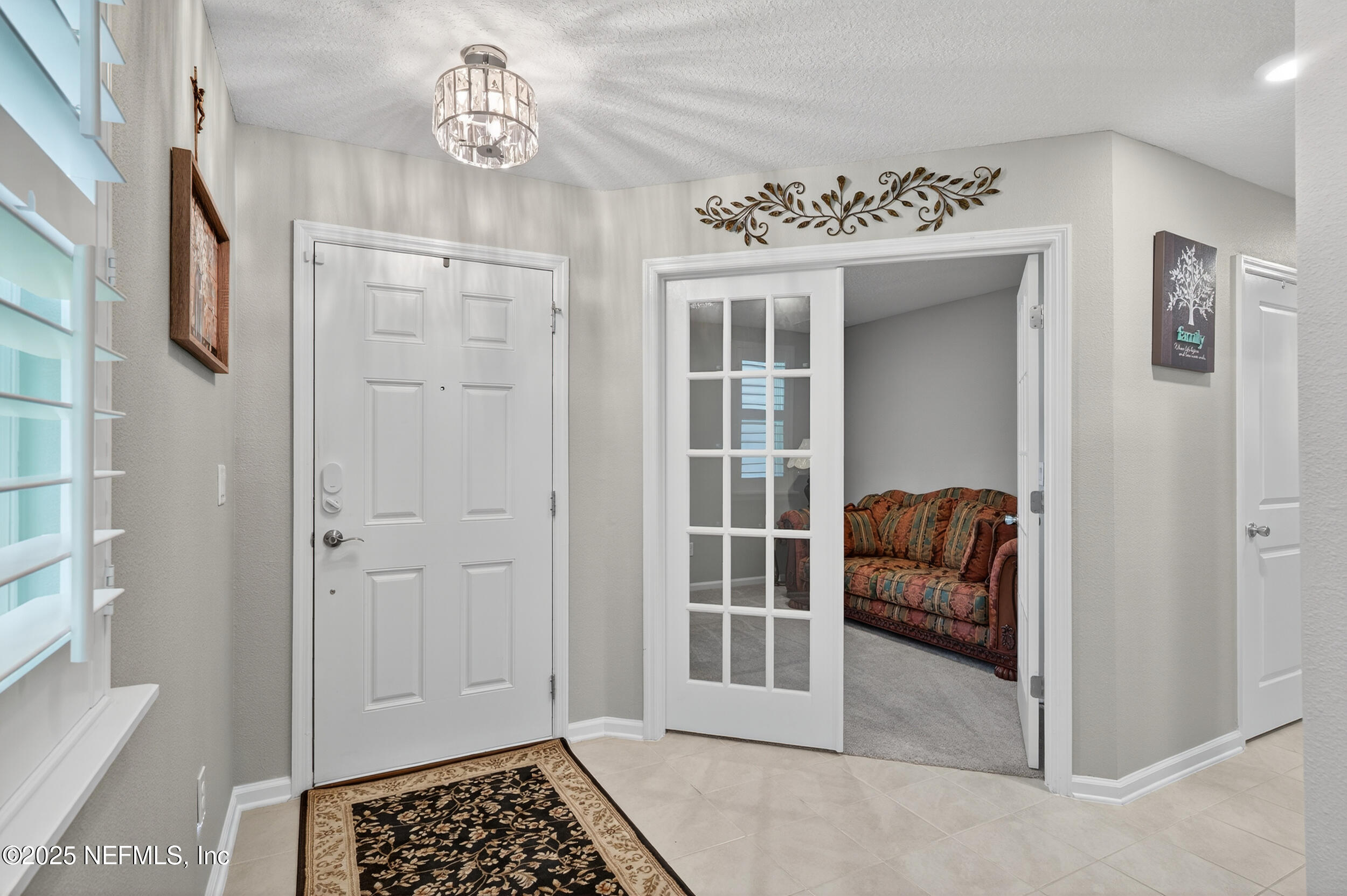 318 Rambling Brk Trail St. Johns, FL 32259 - Photo 6 of 26 a view of livingroom with furniture and windows