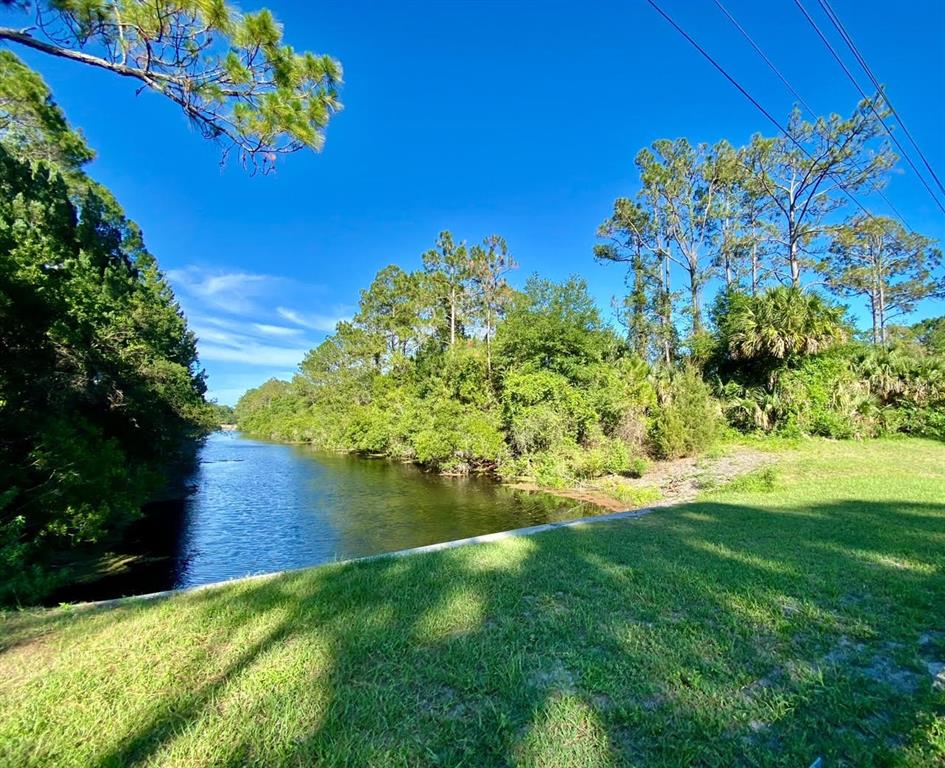 Backyard view of the Duplex lot - facing Canal