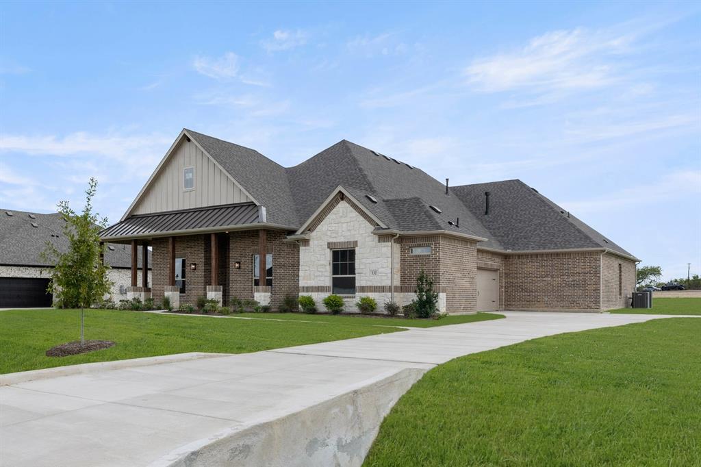 132 Evanston Court Rhome, TX 76078 - Photo 3 of 40 132 Evanston-Front-2