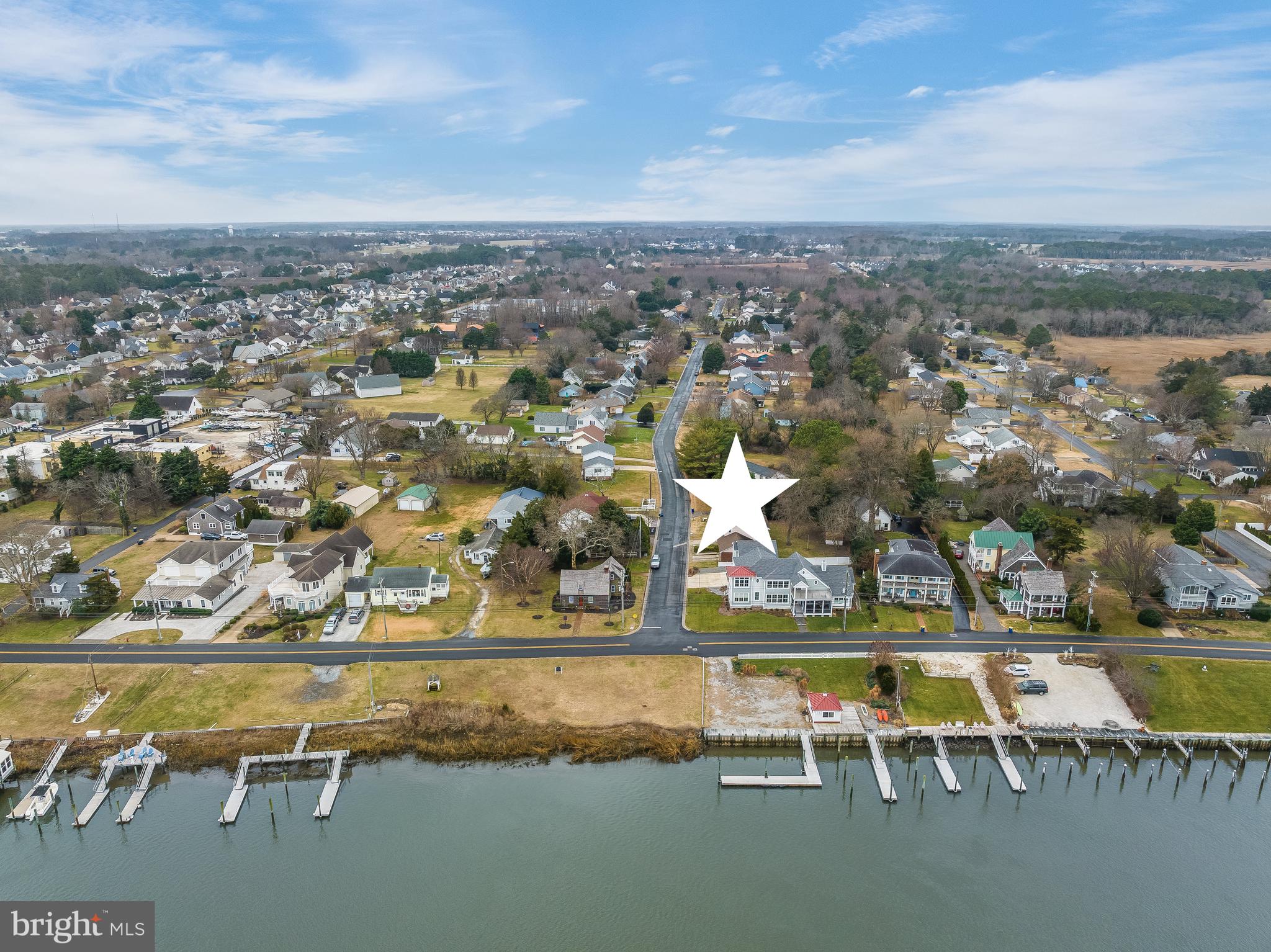 1-2 Harborview Road Lewes, DE 19958 - Photo 14 of 43 an aerial view of a swimming pool with outdoor seating