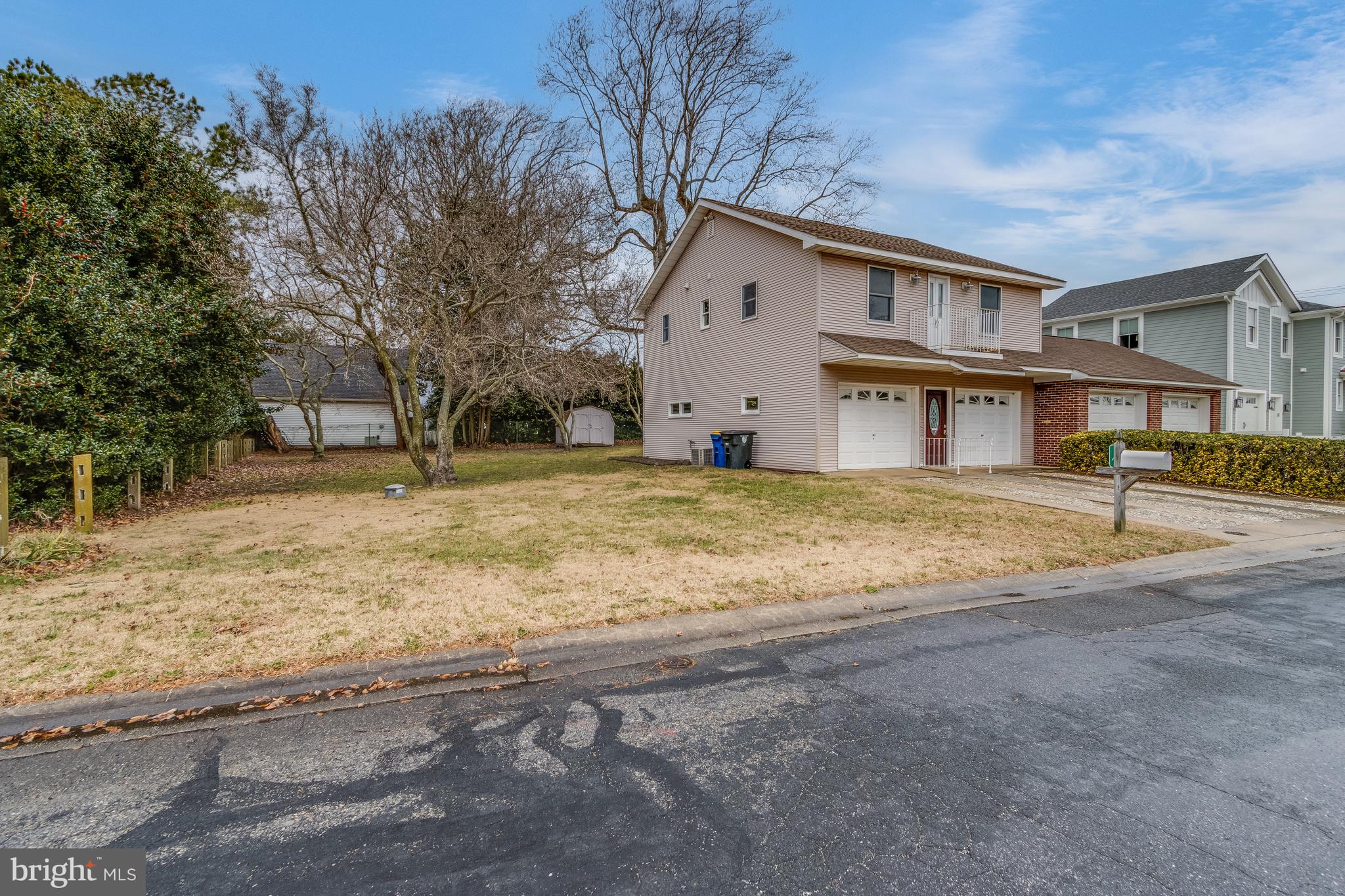 1-2 Harborview Road Lewes, DE 19958 - Photo 23 of 43 a view of a house with a yard