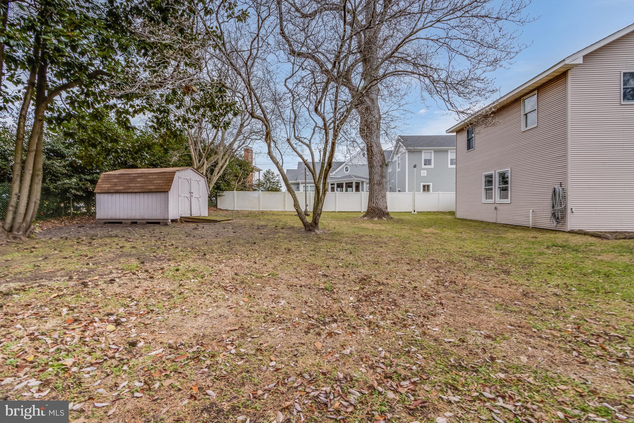 1-2 Harborview Road Lewes, DE 19958 - Photo 26 of 43 a house view with a garden