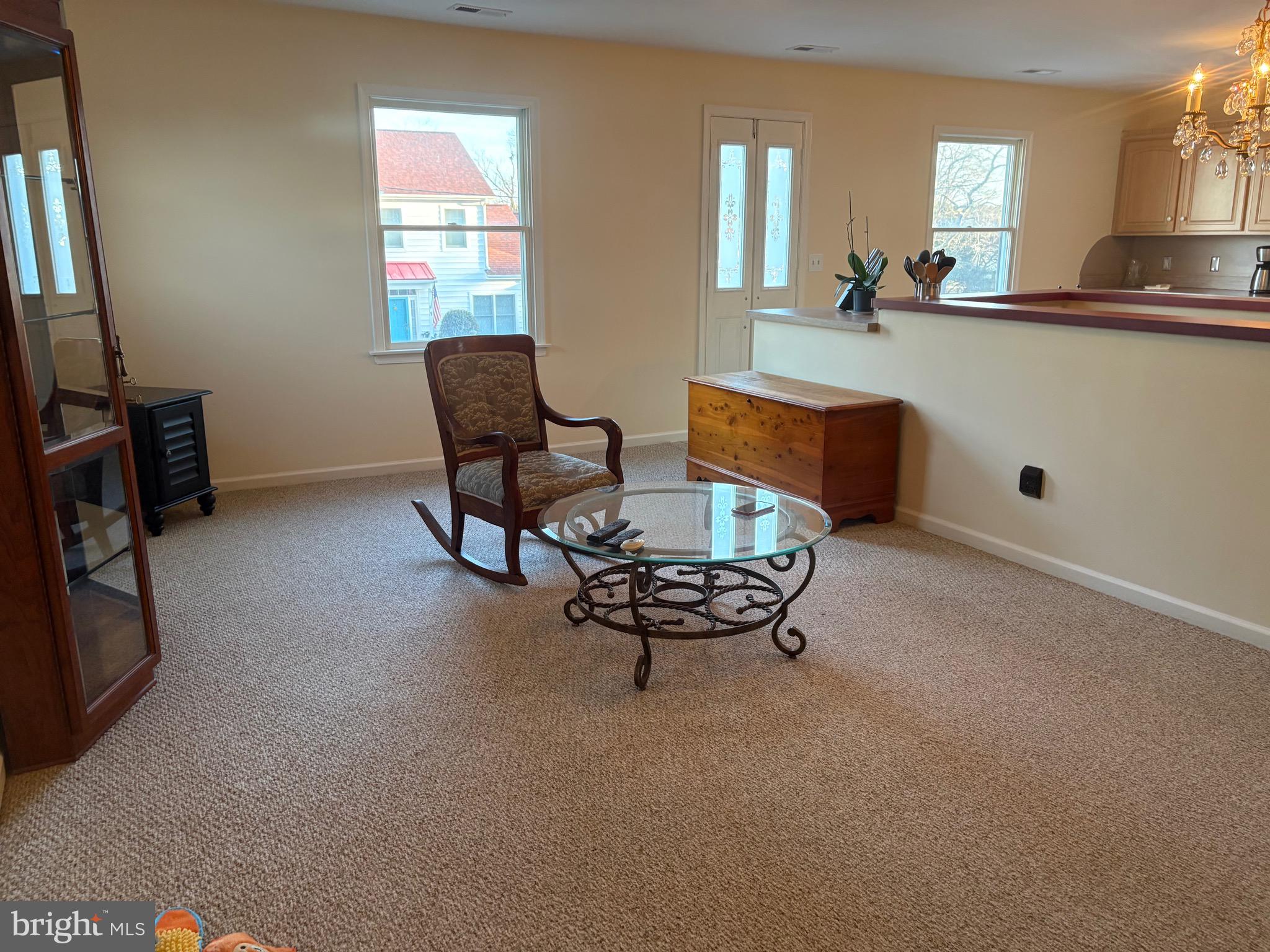 1-2 Harborview Road Lewes, DE 19958 - Photo 27 of 43 a living room with furniture and a flat screen tv