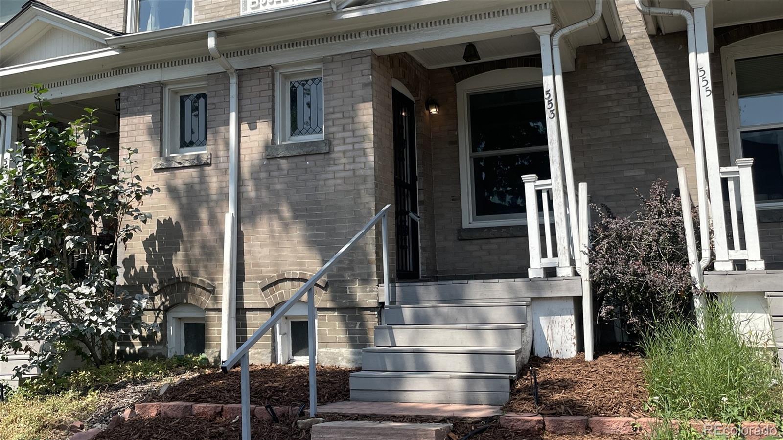 553 Logan Street Denver, CO 80203 - Photo 23 of 38 front view of the house