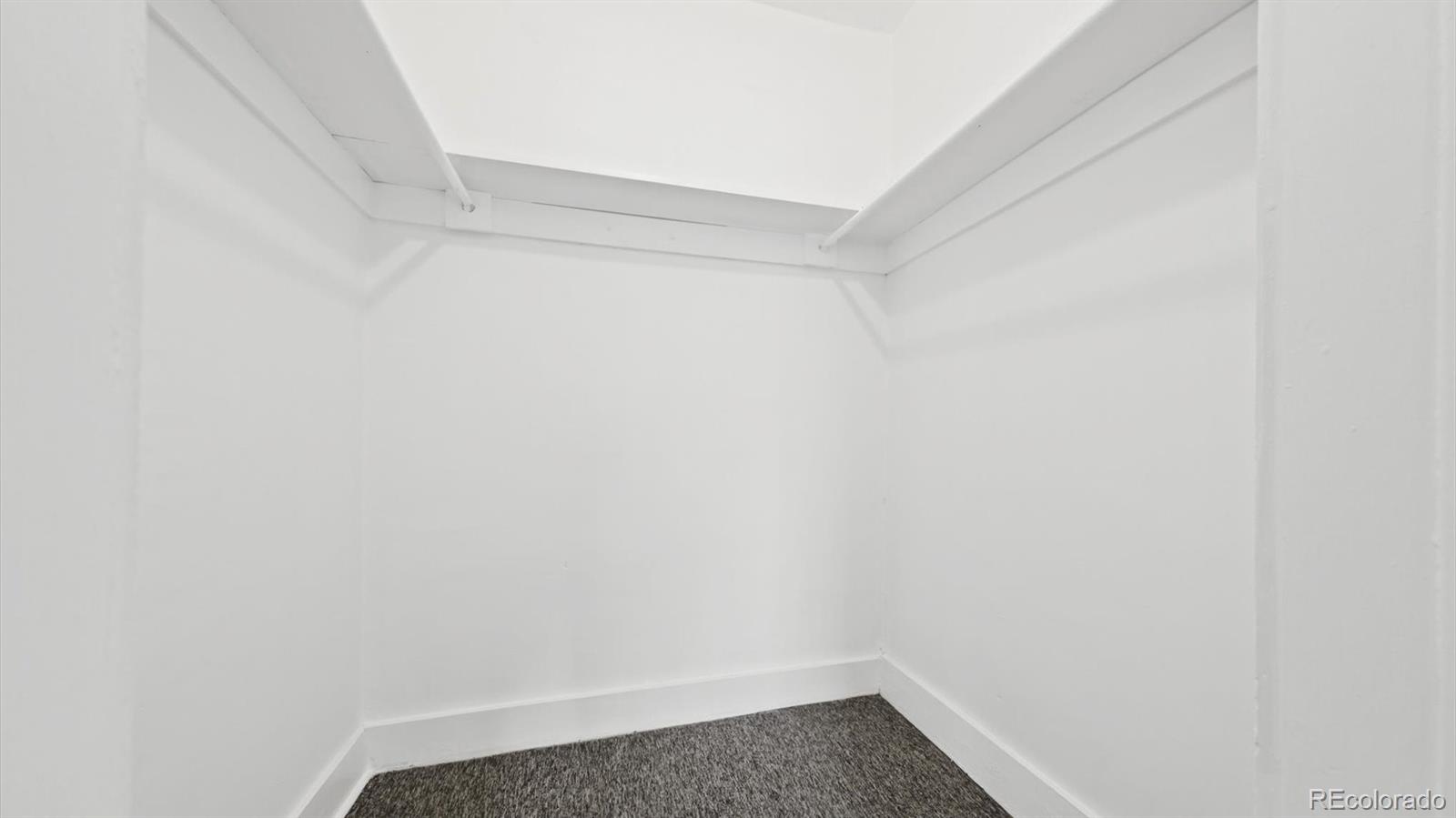 553 Logan Street Denver, CO 80203 - Photo 29 of 38 a small space with wooden floor