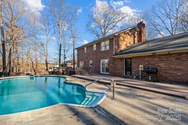 a view of a backyard with a patio