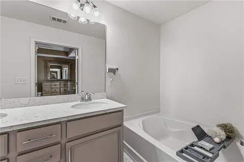 a bathroom with a sink and a bathtub