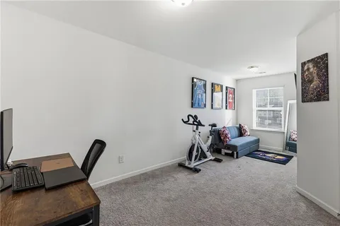 a room with furniture and a window