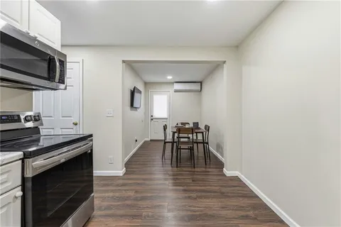 a view of a kitchen with breakfast area