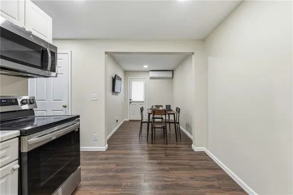a view of a kitchen with breakfast area