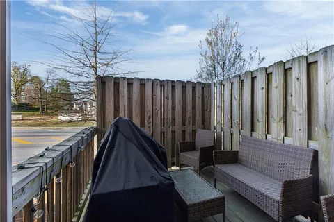 a view of deck with furniture